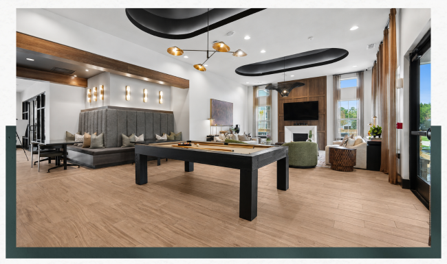 a clubroom with a pool table and chairs